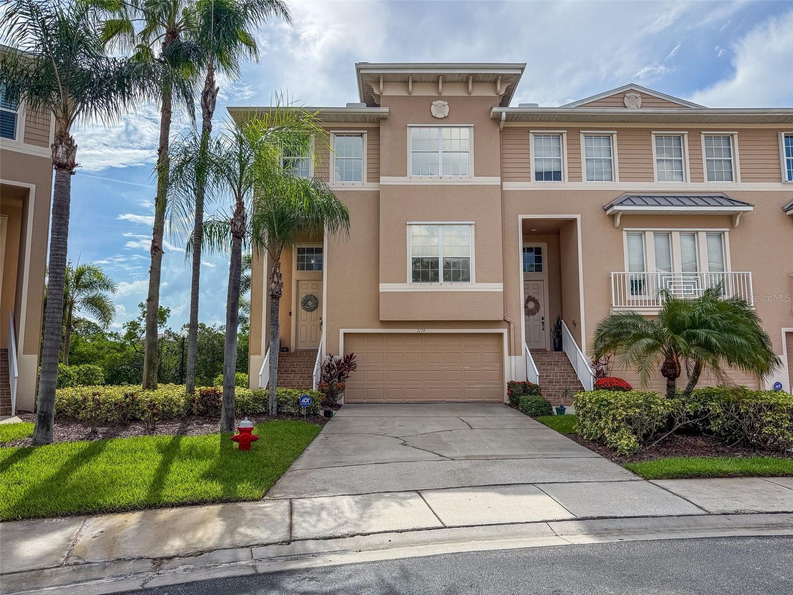 Welcome to Luxury Living in Seminole Isle — a Gated, Resort-Style Community!
This stunning 3-bedroom, 2.5-bath townhome offers 2,090 sq ft of beautifully updated living space across three spacious levels, combining the comfort of a single-family home with the convenience of maintenance-free living.
Step inside and immediately feel the openness of the main living area with 9+ foot ceilings, rich natural light, and beautiful custom tile throughout. The heart of the home is the gourmet kitchen, featuring upscale wood cabinets, granite counters, a brand new backsplash and an oversized center island — ideal for entertaining or everyday living. Additional upgrades include custom built-ins, 5.5” baseboards, crown molding, and LED lighting.
Upstairs, retreat to a spacious primary suite with serene views of the mangroves and no other buildings for miles, plush carpeting, and a custom built-in walk-in closet. The luxurious en-suite bath features a completely renovated soaking tub, frameless glass shower, and elegant fixtures throughout. Two additional bedrooms, a full guest bath, and a versatile loft area perfect for an office or playroom complete the upper level. The interior laundry room includes built-in cabinetry for added convenience.
The lower level offers even more space with a patio leading out to a green area and access to the walking path, a tandem 2+ car garage with ample storage. A second screened balcony off the main floor allows for peaceful outdoor relaxation while enjoying the gorgeous views.
Outside, Seminole Isle is unmatched in lifestyle and amenities:
• Resort-style pool & clubhouse
• Tennis/pickleball courts, fitness center, and walking trail
• Kayak launch, fishing dock, and screened pavilions
• Low HOA fees and a well-managed association
All of this, just minutes from Gulf beaches, Seminole City Center, and an easy commute to Tampa International and St. Pete/Clearwater airports.
BONUS: Home did not experience any water intrusion during recent hurricanes.
?? This is the premier townhome in one of Pinellas County’s most desirable gated communities. Don’t miss your chance to own this move-in ready masterpiece — schedule your private showing today!