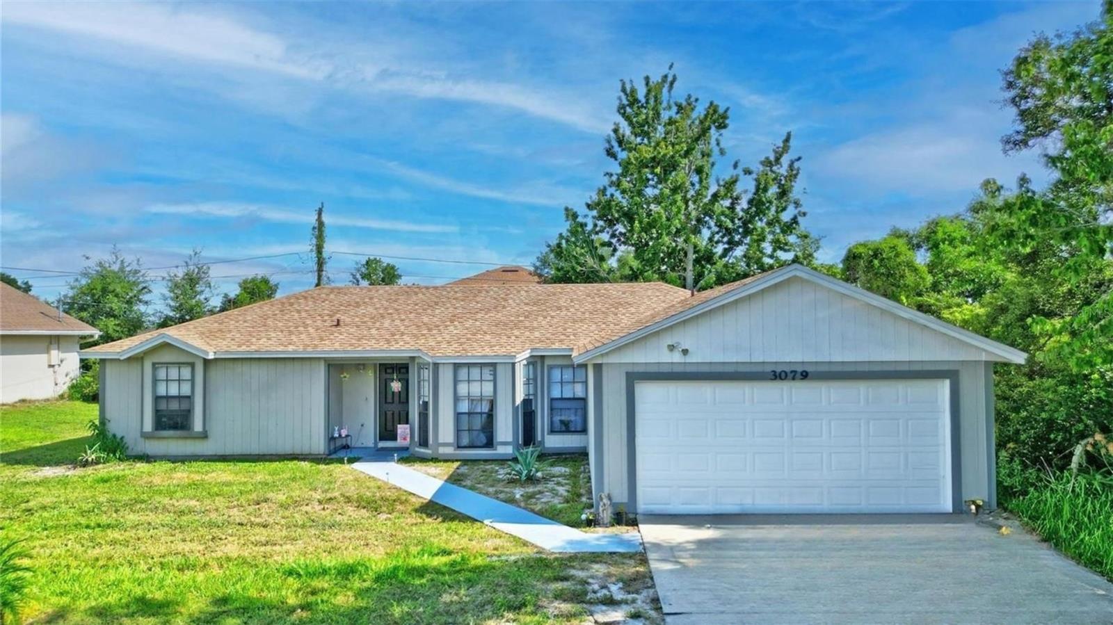 New Roof 2023! Welcome to this 3-bedroom, 2-bath home in the established Deltona Lakes community—offering comfort, functionality, and prime Florida living.
Step inside to a practical floor plan featuring built-in closets in each bedroom, stone countertops, and modern cabinetry in the kitchen—perfect for everyday living or long-term rental potential. The spacious backyard is ideal for outdoor entertaining or weekend relaxation.
With solid structure and move-in ready condition, this property is an excellent fit for first-time buyers, small families, or investors seeking immediate rental income. Tenants are currently in place, making this a great opportunity in a high demand, growing area.
Conveniently located near parks, schools, shopping, and major highways, this home offers great value in a quiet neighborhood.
Schedule your private showing today! Some photos may be virtually staged.