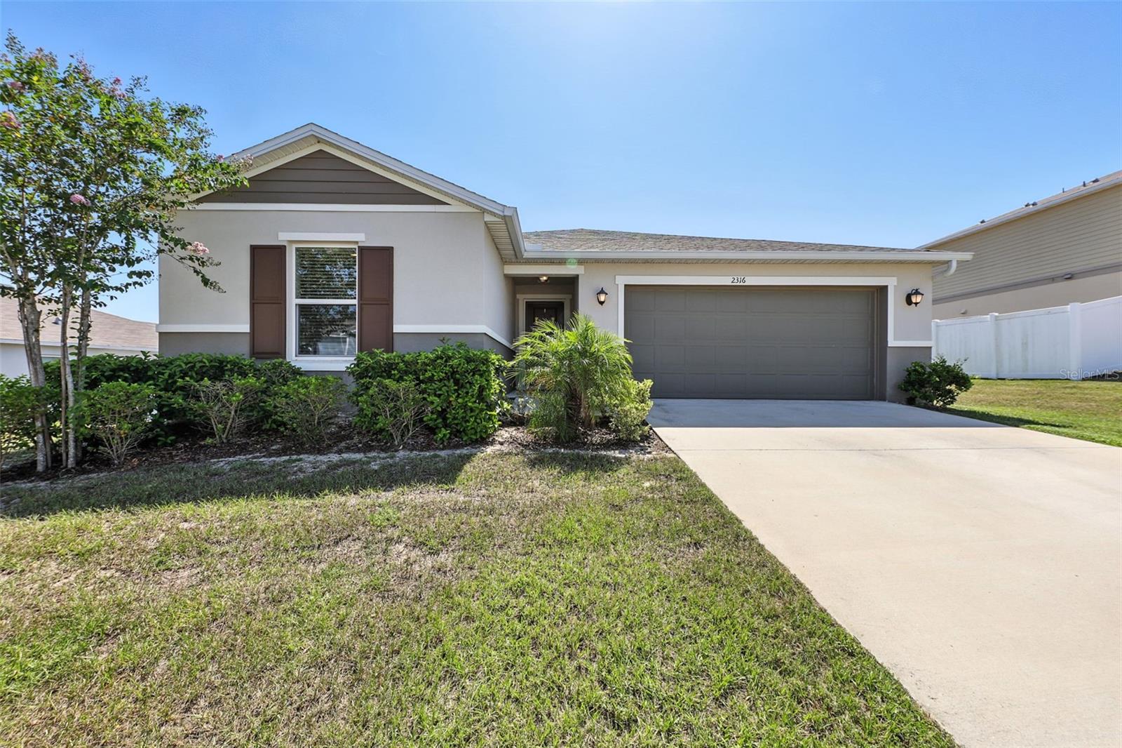 Welcome home to this charming 3/2 only 3 years old beauty. This home sits on almost a quarter acre lot, fenced in on both sides, open in the rear. Enjoy many updates and special remodeled touches in this open and modern home. Low HOA, like country living, but only a 40 minute drive to Orlando, 20 minutes to Clermont. Schedule a tour today!