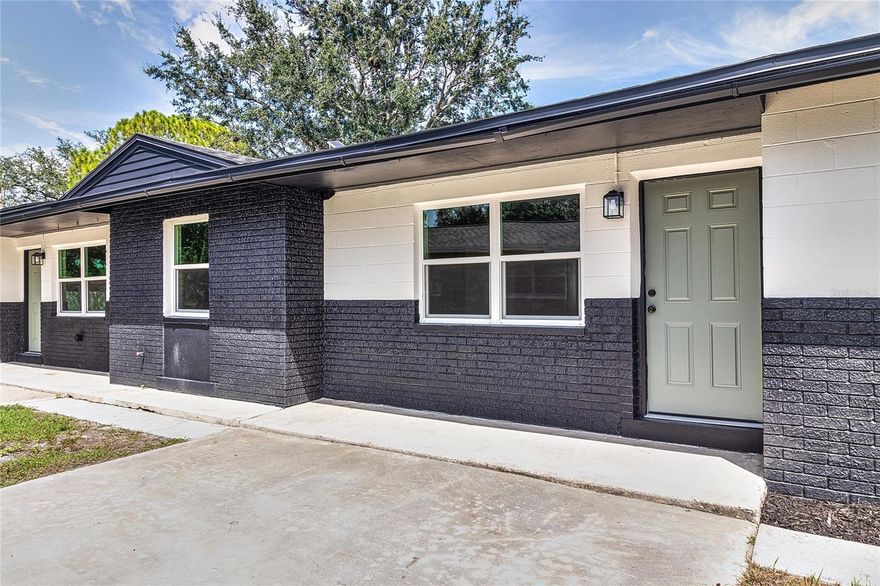 Welcome to 510 91st Ave N, a fully renovated duplex offering modern finishes and strong rental potential. The property features two units, a spacious 3 bedroom 1 bathroom and a 2 bedroom 1 bathroom, each with separate parking and shared laundry. Both units were updated in 2025 with new kitchens including quartz countertops, stainless steel appliances, tile backsplash, and modern fixtures, along with remodeled bathrooms featuring tiled showers, new tubs, vanities, and toilets. Additional improvements include luxury vinyl plank flooring, fresh interior and exterior paint, new doors, trim, lighting, hardware, outlets, and hurricane-rated windows throughout. The property also includes a shed for extra storage, a newer roof from 2013, and fully paid-off solar panels installed in 2021. Located on a .13 acre lot in a desirable St. Petersburg neighborhood just minutes from shopping, restaurants, downtown, and the beaches, this turnkey property offers flexibility for investors or those looking to live in one unit while renting the other.