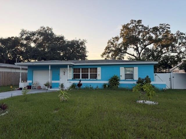 Photo of 10357 Kumquat Ln, Seminole, FL 33772 (MLS # TB8553813)