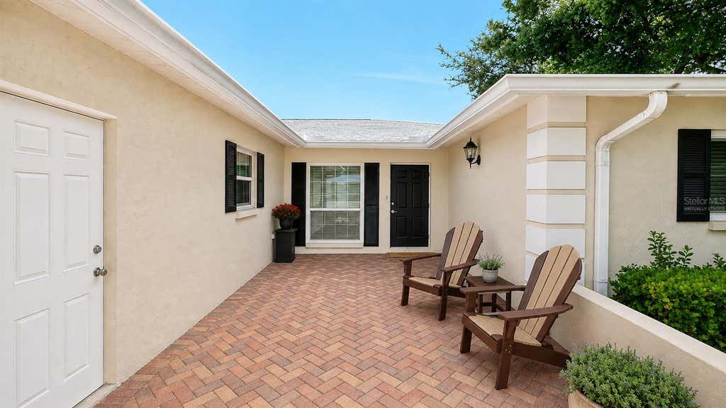 Photo of 5621 Palm Aire Drive, Sarasota, FL 34243 (MLS # A4701814)