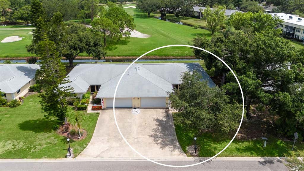 Photo of 5621 Palm Aire Drive, Sarasota, FL 34243 (MLS # A4701814)