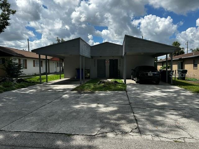 EXCELLENT INVESTMENT OPPORTUNITY, CASH FLOW PROPERTY, RENTED AT COMPATIBLE MARKET VALUE.. this 2 bedroom 1 bath duplex building is conveniently located close to schools, shopping area, distribution warehouses, and easy access to I4, located on a dead end street making this neighborhood quite and with very low motorized traffic. Units feature, carport, tile floors, nice size inside laundry room, cozy kitchen, split bedrooms and large living room. Live in one and rent the other or rent both, either way, great income source.