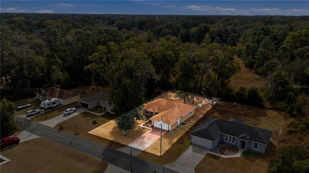 Photo of 7090 SE 124th Lane, Belleview, FL 34420 (MLS # OM717635)