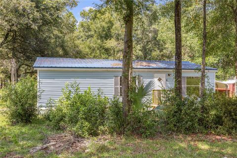 Photo of 10851 NE 110th Lane, Archer, FL 32618 (MLS # GC534070)