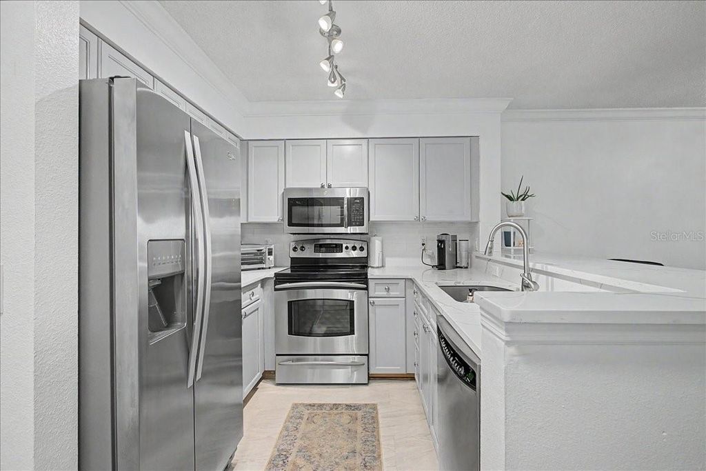 Photo of 2400 Feather Sound Drive #733, Clearwater, FL 33762 (MLS # TB8492028)