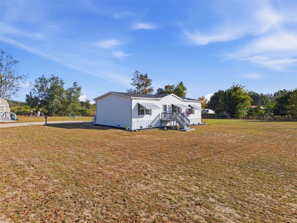 Photo of 12441 Hexam Road, Weeki Wachee, FL 34613 (MLS # TB8447712)