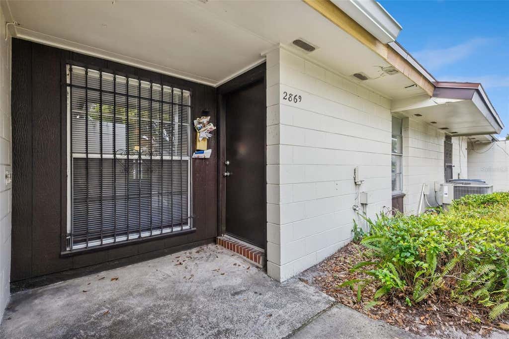 Photo of 2869 Willow Run, Orlando, FL 32808 (MLS # O6429554)