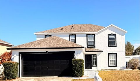Photo of 5764 Royal Hills Circle, Winter Haven, FL 33881 (MLS # O6379870)