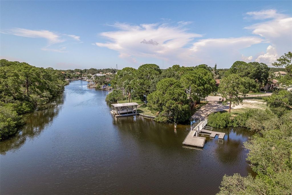 Photo of 14 Baywood Drive, Palm Harbor, FL 34683 (MLS # TB8489311)