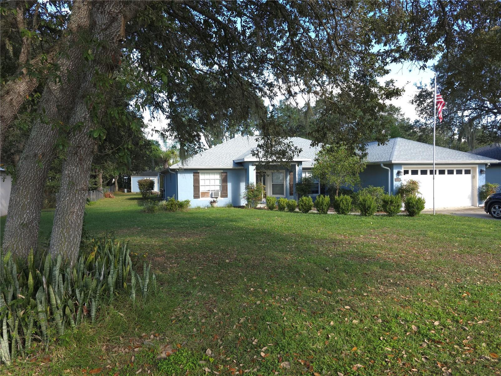 Short Sale. Welcome home to 11179 SW 61st Circle — a beautiful pool-home sanctuary tucked within the desirable Kingsland Country Estates. Offering 1,791 sq ft of comfortable living space on a 0.39-acre lot, this property combines charm, functionality, and incredible potential for the next owner.
Step inside and you’ll find a bright, open-concept floor plan with vaulted ceilings, a spacious great room, and a seamless connection between living, dining, and outdoor spaces. The kitchen features a breakfast bar, pantry, and cozy eat-in nook overlooking the screened salt-water pool — ideal for everyday living or entertaining guests.
The primary suite serves as a relaxing retreat with tray ceilings, a generous walk-in closet, and an ensuite bathroom featuring dual vanities, a walk-in shower, and a soaking Jacuzzi tub. Two additional bedrooms offer flexibility for guests, office space, or hobbies.
Outside, unwind in your private backyard oasis with a screened-in pool, heated for year-round enjoyment, plus a spacious patio, mature landscaping, and fire-pit area perfect for gatherings under the stars. The oversized lot offers both privacy and room to breathe.
Located in a low-HOA community with easy access to shopping, dining, medical services and major roadways, this home strikes the perfect balance between peaceful retreat and convenient living.
Sale and terms are subject to lender approval and short sale guidelines.