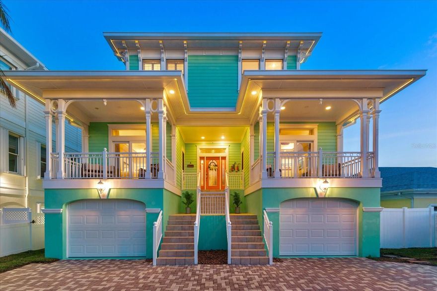 SURROUND YOURSELF IN PARADISE WITH THIS ONE-OF-A-KIND KEY WEST–STYLE WATERFRONT RETREAT. Wake up to breathtaking views of Boca Ciega Bay, enjoy deep-water, unobstructed boating access to the Gulf of Mexico, and take a short stroll to the sugar-white sands of St. Pete Beach. Custom built in 2004 to a 14’ elevation with superior construction quality, this meticulously maintained home offers the perfect blend of coastal elegance and everyday luxury.
Designed for both comfort and entertaining, the residence features 4 spacious en-suite bedrooms, 5.5 bathrooms, an elevator, a 4-car garage, private office, and a gym/media space, spanning over 3,800 square feet of refined coastal living. Add an additional 1,200 square feet of covered balconies and patios, and you’ll enjoy more than 5,000 square feet of covered living space—ideal for embracing the Florida lifestyle year-round.
The bright, open-concept interior showcases 9’ ceilings, expansive windows, and a seamless indoor-outdoor flow that floods the home with natural light and stunning water views. The chef’s kitchen is a showstopper, featuring solid wood cabinetry, granite countertops, built-in Sub-Zero refrigerator, oven/microwave combo, glass cooktop, center prep island, and a generous high-top bar—perfect for hosting friends and family.
Thoughtful custom details are found throughout, including coffered ceilings, crown molding, solid wood flooring, plantation shutters, a gas fireplace, and elevator access to all levels. Each bedroom is a private en-suite retreat, while the primary suite offers top floor sweeping bay views, a walk-in closet, a luxurious spa-style bath, and a private terrace ideal for sunset evenings. 
Step outside to your own resort-style waterfront oasis. Enjoy a new Trex dock with a 30,000-pound boat lift, providing effortless access to the Gulf—perfect for boating enthusiasts. Outdoor living is elevated with expansive balconies, a full outdoor kitchen, built-in fire pit, heated pool and spa, approximately 750 square feet of turfed space, and ample room for lounging, dining, and entertaining against the spectacular bay backdrop.
This exceptional home delivers the ultimate coastal lifestyle—just a short walk to the beach, restaurants, shops, and entertainment. Conveniently located only 15 minutes to downtown St. Petersburg and 30 minutes to Tampa International Airport, this is truly the best of both luxury and location.
This is more than a home - it’s a lifestyle! Your waterfront paradise awaits.