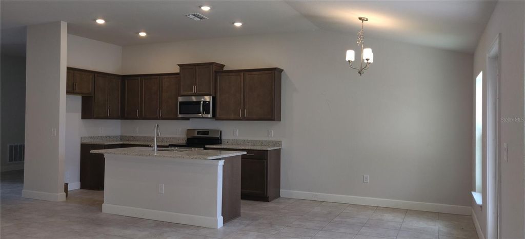 Photo of 5477 Ocean Breeze Drive, Spring Hill, FL 34609 (MLS # OM708743)