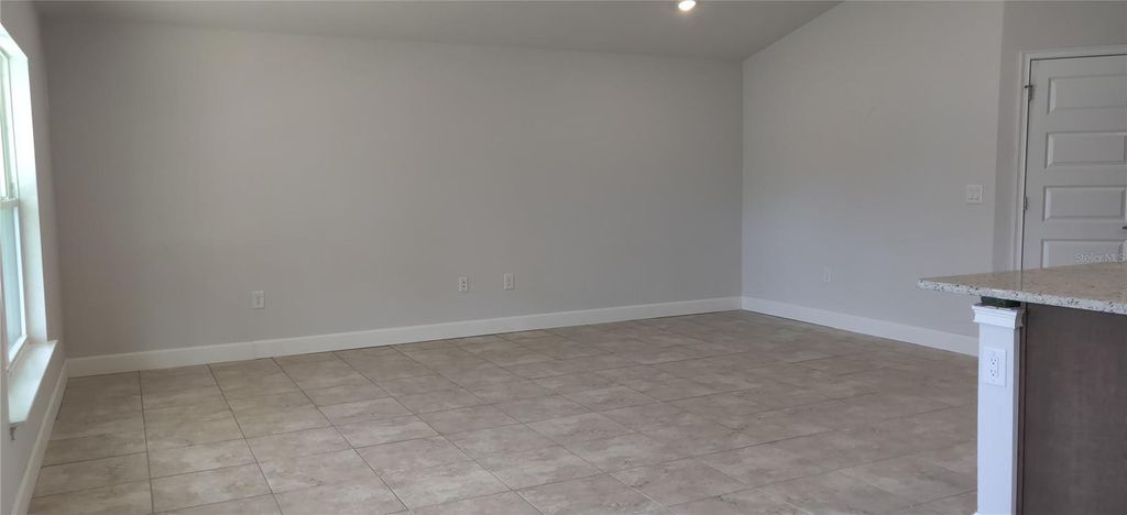 Photo of 5477 Ocean Breeze Drive, Spring Hill, FL 34609 (MLS # OM708743)