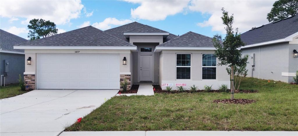 Photo of 5477 Ocean Breeze Drive, Spring Hill, FL 34609 (MLS # OM708743)