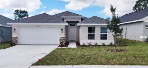 Photo of 5477 Ocean Breeze Drive, Spring Hill, FL 34609 (MLS # OM708743)