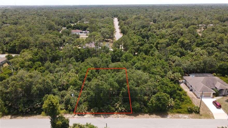 Wooded building lot in residential area of North Port. Close to schools and services. No known issues. Flood Zone X. Short driving distance to the Atlanta Braves Stadium, Warm Mineral Springs, and the upcoming Wellen Park Development. Please see Virtual Tour for flyover of property.