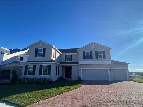 Photo of 457 Switchgrass Loop, Minneola, FL 34715 (MLS # O6354191)