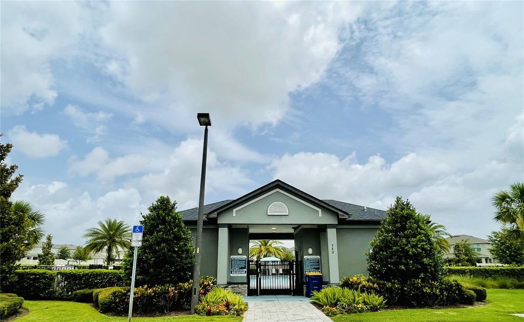 Photo of 457 Switchgrass Loop, Minneola, FL 34715 (MLS # O6354191)