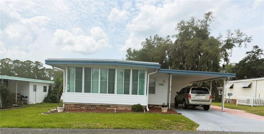 Beautifully furnished 2-bedroom, 2-bath home that is exceptionally clean and well maintained! This move-in ready property features a new roof in 2024 and a new A/C unit in 2025 for added peace of mind. Both bedrooms have built-in closets along with spacious walk-in closets. The updated kitchen includes newer countertops and a double pantry providing plenty of storage space. French doors lead into the bright and inviting Florida room, perfect for relaxing or entertaining. Outside, enjoy the large golf cart driveway that wraps around to the back of the home, offering ample parking and easy access. This charming home has been lovingly cared for and is ready for its new owners!
Hawthorne at Leesburg is a vibrant 55+ community that blends comfort, convenience, and affordability. For just $397 a month, residents enjoy a maintenance-free lifestyle that includes water, sewer, lawn care, emergency services, and access to a wealth of resort-style amenities plus secure RV and boat storage. The expansive clubhouse is the social hub of the community, offering over 100 organized activities, a welcoming lounge, card rooms, billiards, a fitness center, a library, and a fine arts studio. A dedicated program coordinator ensures there’s always something fun and engaging on the calendar. For those who love the water, the private marina offers more than 120 boat slips with direct access to the beautiful Harris Chain of Lakes. Safety and peace of mind come standard, thanks to a 24/7 on-site team of state-certified firefighter/EMTs, emergency vehicles, and in-home emergency response buttons. Surrounded by natural beauty, the community features scenic walking trails, serene lake views, and plenty of opportunities for fishing and boating. The golf cart-friendly streets make it easy to explore nearby shopping, dining, and medical facilities. With a sparkling pool, endless recreational options, and a warm, welcoming atmosphere, Hawthorne at Leesburg isn’t just a place to live it’s a lifestyle. Schedule your showing today and discover the perfect blend of comfort, community, and convenience.