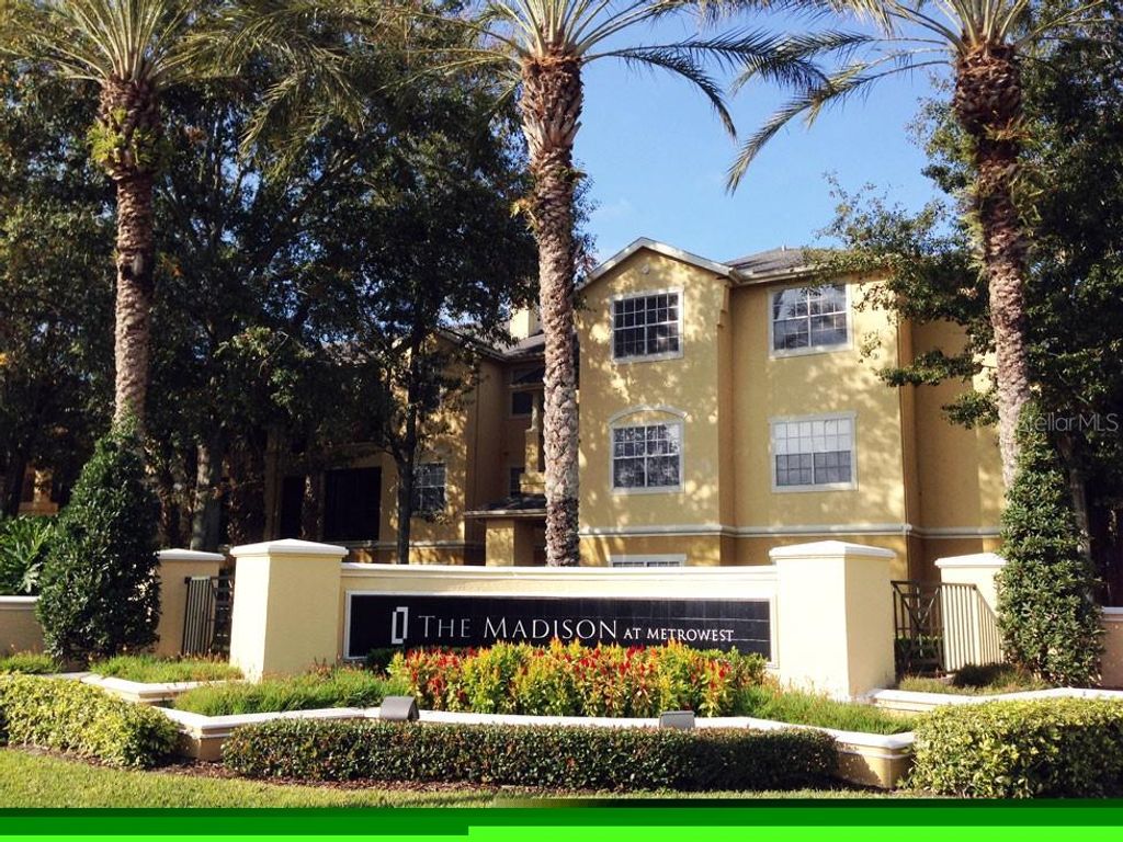 Photo of 2572 Robert Trent Jones Drive #1220, Orlando, FL 32835 (MLS # O6395409)