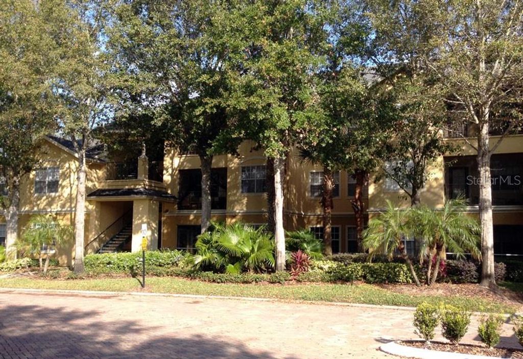 Photo of 2572 Robert Trent Jones Drive #1220, Orlando, FL 32835 (MLS # O6395409)