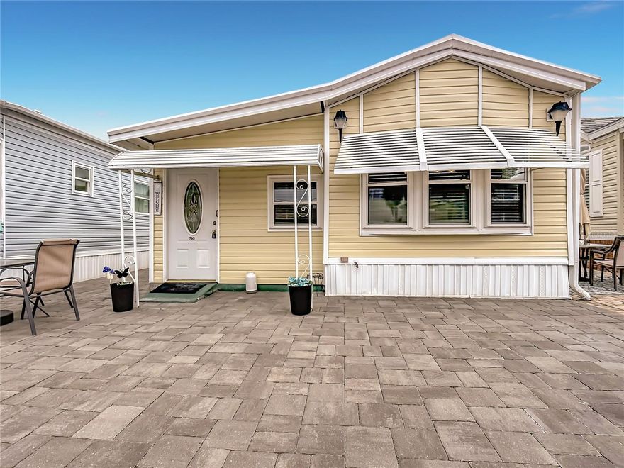 Fantastic location directly across the street from the 2nd community pool and Bath House 3 - great for guests!! This fully furnished 1 bed, 1 bath home offers a large Bonus room (currently used as a 2nd bedroom), totally REMODELED bathroom with large walk-in shower and the home benefits from NEW PLUMBING, NEW VINYL SIDING and EXTRA LARGE paved drive which easily accommodates 2 vehicles. Convenient storage & laundry room lies at the rear of the property and is equipped with new Washer/Dryer.  This highly sought after 55+ guard gated community of Outdoor Resorts has NO LOT RENT - YOU OWN THE LAND!! Come and experience the fantastic lifestyle that this unique community offers. Amenities include 2 heated swimming pools; private access to a 179 acre lake (Lake Davenport); 9 hole golf course; tennis; pickleball; shuffle board; 9 hole putt-putt golf; 8 bath houses scattered throughout the community; laundry facilities; beautiful 2 story clubhouse offering an endless array of entertainment throughout the year. All of this for the low Association Fee of $768 per quarter which also includes Cable TV, Lawn Mowing, Sewer, Trash and Water. UNBELIEVABLE VALUE FOR MONEY - you won't find a more AFFORDABLE LIFESTYLE !!!!  Please remember 55+ and 1 pet rule. The park benefits from close proximity to Disney, medical facilities, restaurants & grocery stores. Don't delay!! Put this home on your 'must see list' and ask to arrange a viewing today.