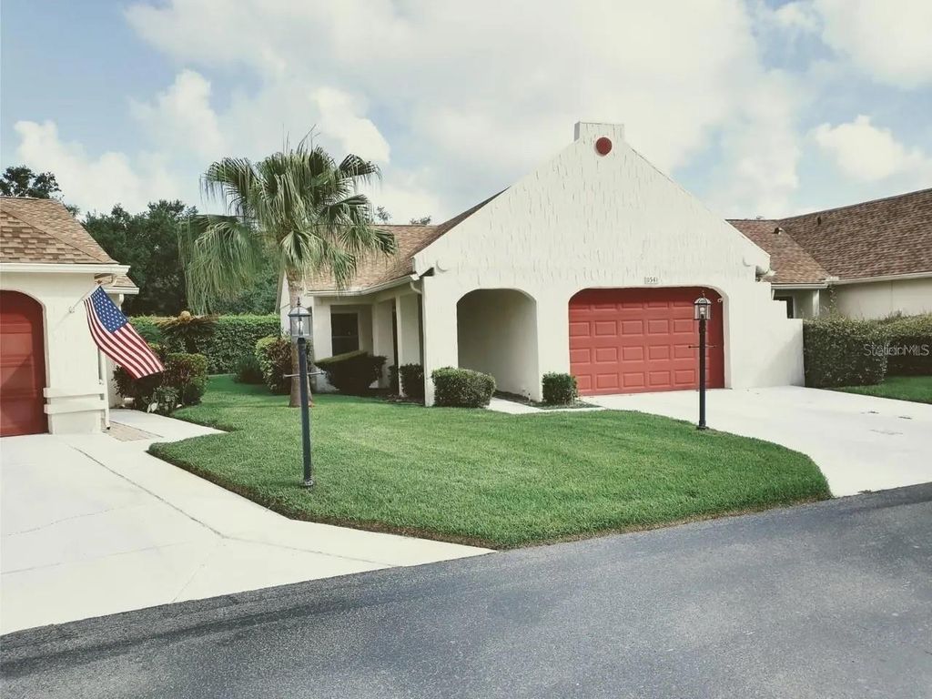 Photo of 11541 Orleans Lane, Port Richey, FL 34668 (MLS # O6382680)