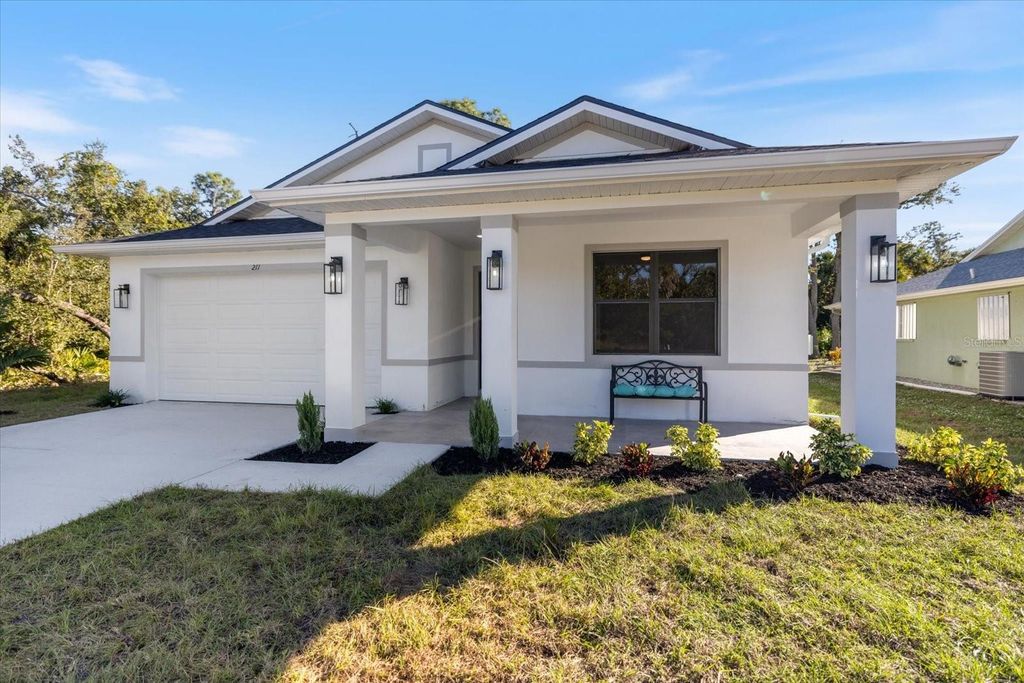 Photo of 211 Cougar Way, Rotonda West, FL 33947 (MLS # N6141488)