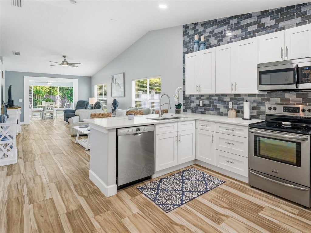 Photo of 2255 Hawks Cove Circle, New Smyrna Beach, FL 32168 (MLS # NS1088637)