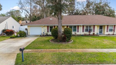 Photo of 1054 W Samms Avenue, Port Orange, FL 32129 (MLS # FC307307) Photo of 1054 W Samms Avenue, Port Orange, FL 32129 (MLS # FC307307)