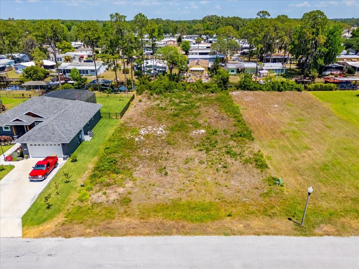 JUST REDUCED! BACK ON THE MARKET DUE TO BUYER DEFAULT. Canal-Front Vacant Land – Cleared & Ready to Build!
Discover the perfect opportunity to build your dream home on this prime canal-front lot with direct access to beautiful Lake Eustis and the entire Lake Harris Chain of Lakes! This cleared property offers an ideal setting for boating, fishing, and waterfront living. Enjoy the convenience of being right on the canal, where you can launch your boat and explore miles of scenic waterways.
Located in a peaceful and desirable area, this property provides the perfect blend of tranquility and accessibility to nearby shopping, dining, and outdoor recreation. Don’t miss this rare opportunity to own waterfront land in a sought-after location!