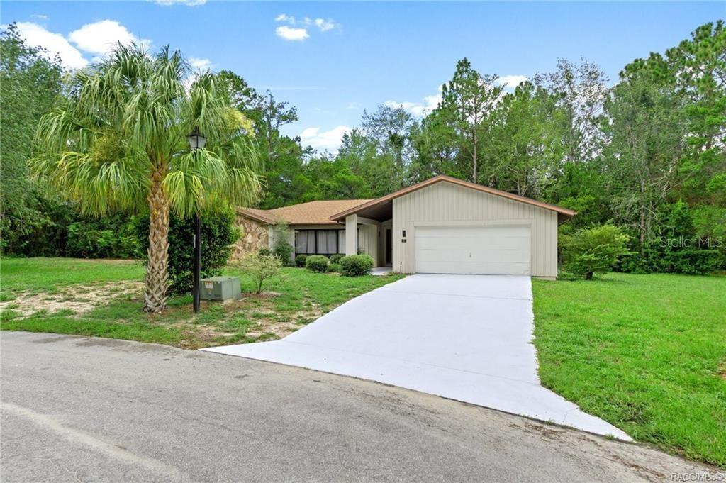 One or more photo(s) has been virtually staged. One or more photo(s) has been virtually staged. Amazingly updated 4/2/2 pool home with over 2,300 sq ft & over 3,300 total square feet situated on a quiet cul-de-sac! This totally renovated home with a spacious open floor plan sits on an awesome 0.55 acre lot! Almost all new lighting, fans. etc.Lovely patio pavers adorn the enormous lanai and surround the in-ground pool jacuzzi/spa tub make this home desirable for outdoor living. The total renovation on this home includes: freshly painted inside & garage, new vinyl plank flooring, new 20” porcelain tile in bathrooms & wash room, all stainless steel appliances including new LG stainless washer/dryer, new inside & outside modern lighting & fans, sprinklers, new kitchen cabinets, granite countertops in kitchen (with tiled backsplash) & all granite counter sinks in bathrooms. HVAC and roof (2015), pool pavers (2016). New Bosch Dishwasher. The work has all been done for you so take this opportunity to enjoy all the recreation and relaxation that the Florida lifestyle has to offer! Two rooms have been virtually staged for photos. Newer Alexa Thermostat installed, newer pool pump, electric pool heater, hot water tank and garage door opener. Luxury Vinyl Planking.