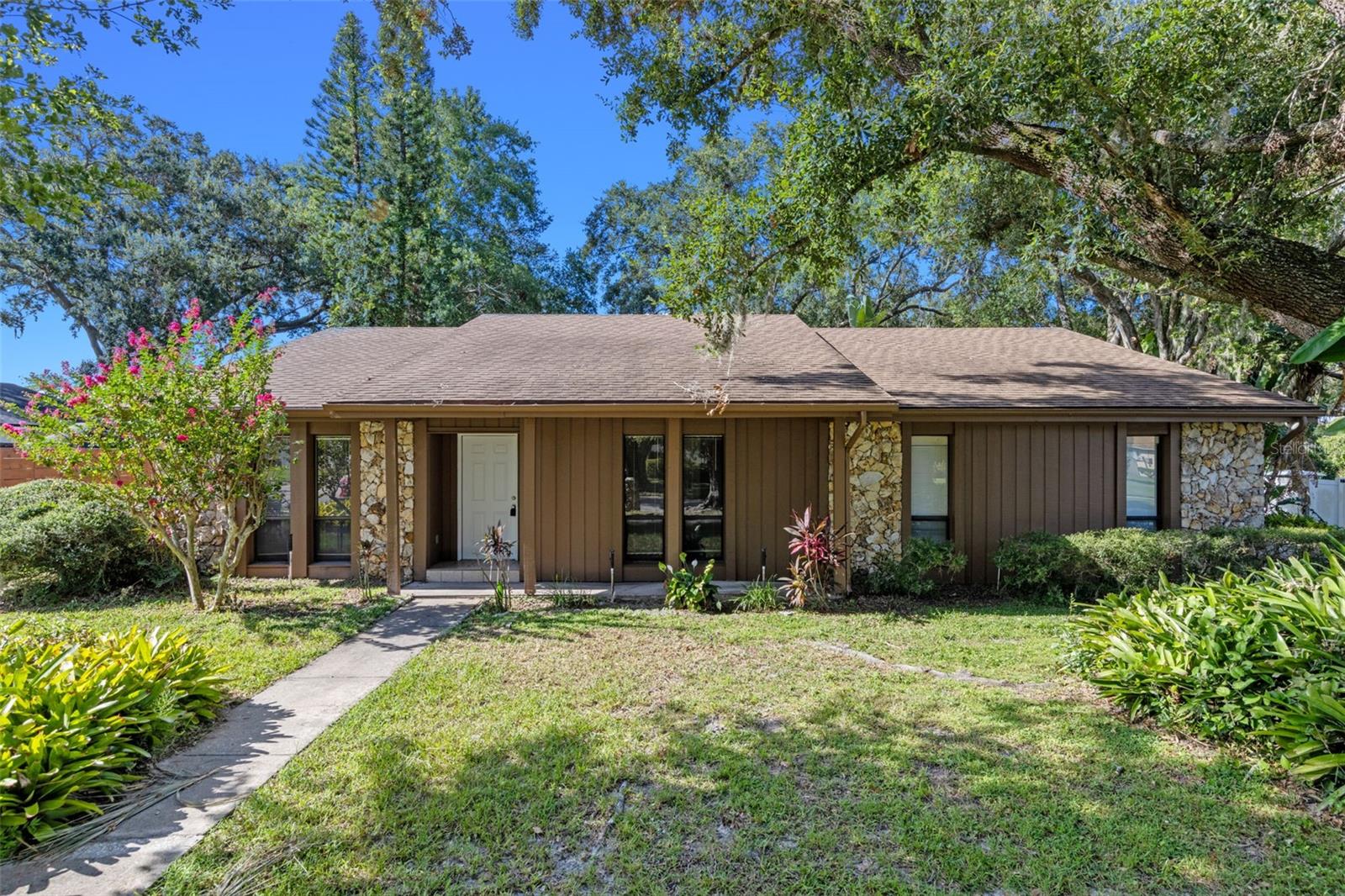 AVAILABLE NOW in the golfcart district! Charming 3 bedroom, 2 bath home with spacious backyard, screened in patio, and no rear neighbors. Upon entering you are greeted by a formal dining, large living with fireplace, French doors opening to the peaceful patio. Master bedroom features a walk-in closet, ensuite bath, and access to the patio. Split floorplan with two additional bedrooms and full bath. Minutes from Downtown Winter Garden, farmers market, shopping, local dining, West Orange Trail, local parks, and much more! Don't miss your opportunity to call it home, schedule a private showing today!