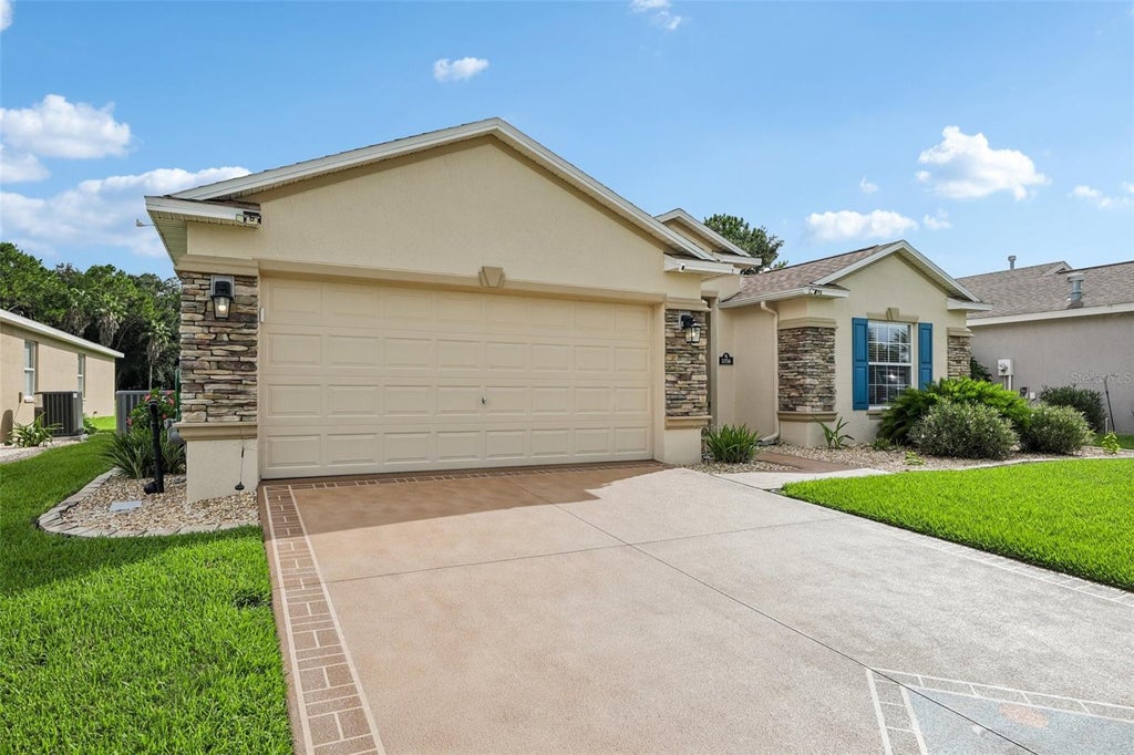 Photo of 1056 SW 159th Street, Ocala, FL 34473 (MLS # O6431065)