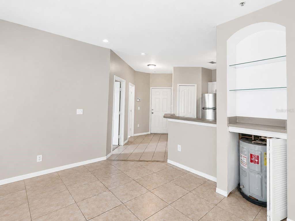 Photo of 2603 Maitland Crossing Way #101, Orlando, FL 32810 (MLS # O6436936)
