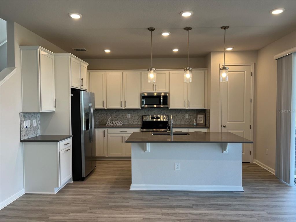 Photo of 1024 Griffon Avenue, Lake Alfred, FL 33850 (MLS # O6378653)