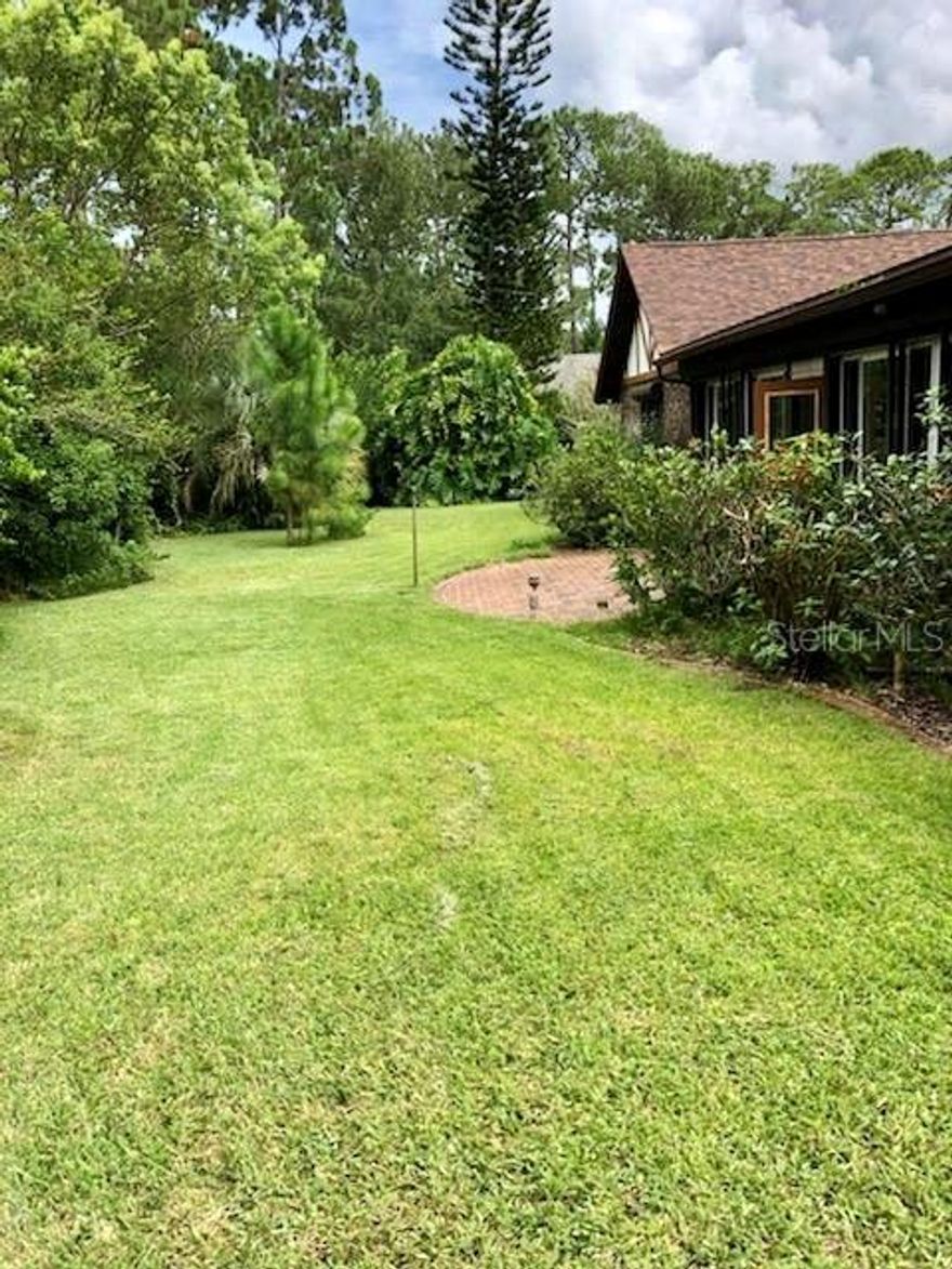 Golf course living overlooking the 8th hole. Enter your home into a spacious great room with fireplace and cathedral ceiling. Open floor plan with eat-in kitchen and large dining room. This split plan home has skylights, security system, solar assisted water heater, hurricane shutters, irrigation system. Roof 2015, upgraded a/c, new carpet throughout (except 3rd bedroom), new vanity in master bath, new tile in kitchen and foyer, pergo hardwood floor in family room. PROFESSIONAL PICURES COMING SOON! ;Water: City