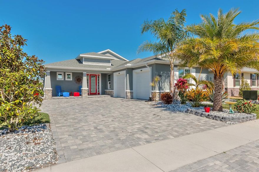 Amazing Johnson Group built home, as like new as you can get. This is by far one of the rarest and most unique homes you will ever find. Offering a space that with a touch of a button turns the outside to the inside. There is a huge lanai with a built -in kitchen/grill, fireplace, cedar tongue and groove ceilings that when you hit a  button the electric weather shutters come down to enclose it completely in. Located on a premier lakefront lot with an amazing heated salt filtered pool and hot tub and cabana. The home has a whole home solar panel system for its green power source. This amazing home can be all yours. Offering 3 bedrooms and 2 bathrooms with high end vinyl plank flooring throughout, 12 ft ceilings, granite counters, soft close doors and drawers, skylight, custom crown molding, and so much more. A true must see, won't last long. All information is intended to be accurate but is not guaranteed. ;Water: City