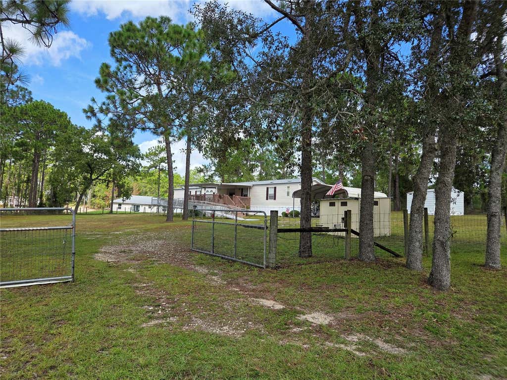 Photo of 750 NE 131st Terrace, Williston, FL 32696 (MLS # OM730111)