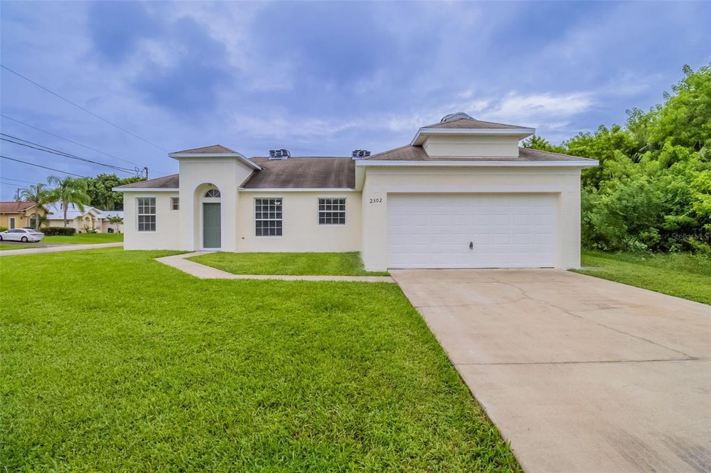 Photo of 2302 SW Webster Lane, Port Saint Lucie, FL 34953 (MLS # O6352118)
