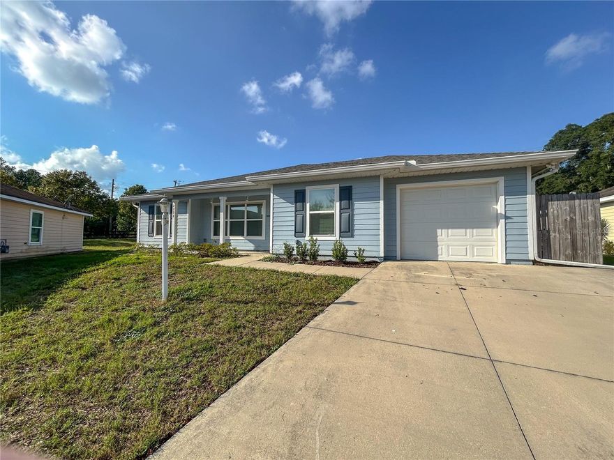 Welcome to this beautifully updated 3-bedroom, 2-bath home conveniently located in Gainesville! This move-in ready property features an open layout with fresh flooring, neutral paint, and abundant natural light throughout. The spacious kitchen offers modern stainless steel appliances, plenty of cabinet storage, and a breakfast bar that flows into the main living area—perfect for entertaining. The primary suite includes dual closets with built-in shelving and a private bath with a tiled shower/tub combo. Two additional bedrooms share a second full bathroom with stylish tile finishes. Enjoy the convenience of an indoor laundry room with washer and dryer included. Outside, you’ll find a one-car garage, a wide driveway, and a fenced backyard ideal for pets, play, or gardening. With its bright and modern feel, this home offers comfort, functionality, and a prime location close to schools, shopping, and downtown Gainesville. Grad students welcome. 3 pets welcome