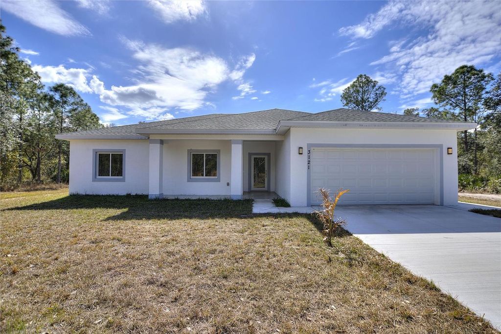 Photo of 3121 Gardenia Drive, Indian Lake Estates, FL 33855 (MLS # P4937635)