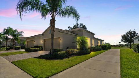 Photo of 1825 Flora Pass Place, Kissimmee, FL 34747 (MLS # O6355192)