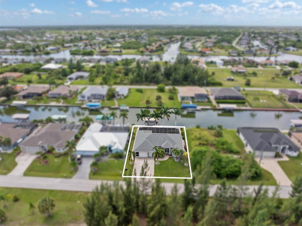 Photo of 15776 Melport Circle, Port Charlotte, FL 33981 (MLS # C7530094)