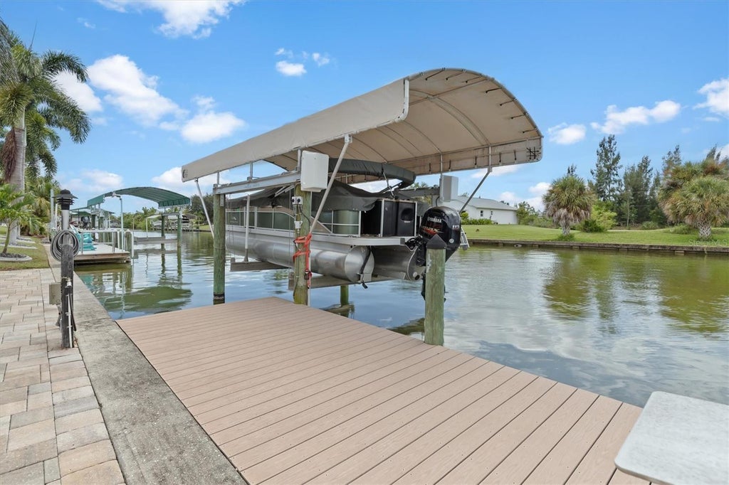Photo of 15776 Melport Circle, Port Charlotte, FL 33981 (MLS # C7530094)