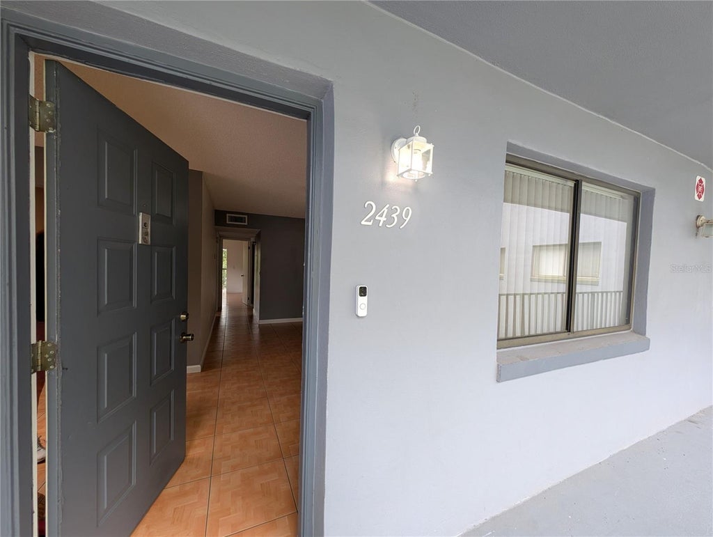 Photo of 2439 Oak Park Way #217, Orlando, FL 32822 (MLS # O6415337)