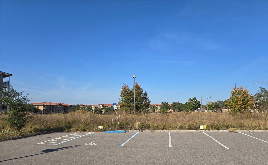 Photo of 821 Retreat Boulevard #102, Davenport, FL 33897 (MLS # S5138923)