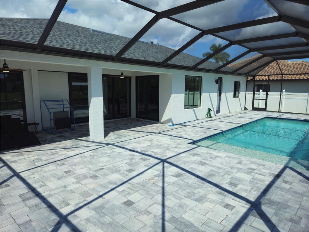 Photo of 136 Kamal Parkway, Cape Coral, FL 33904 (MLS # C7527129)